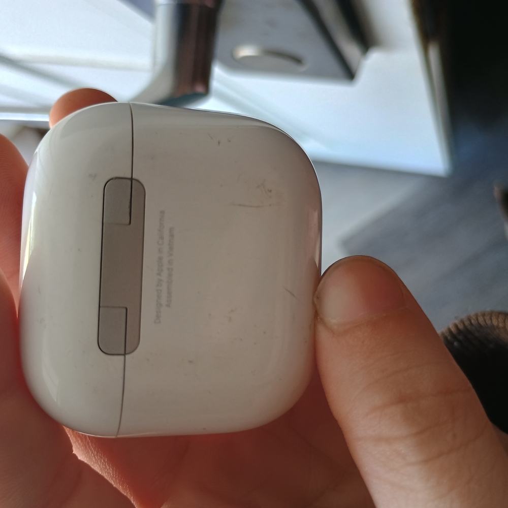 Apple Airpods And Case.